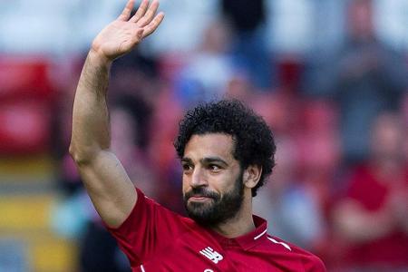 Salahs mintgrüne Fußball-Schuhe im Museum ausgestellt Salahs mintgrüne Fußball-Schuhe im Museum ausgestellt