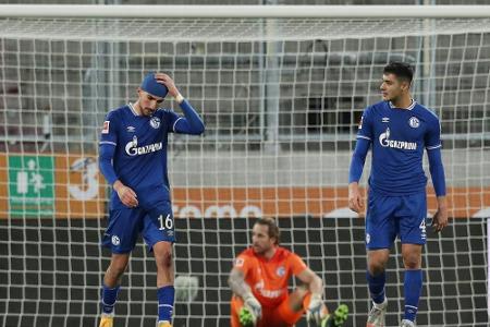 Schalke weiter sieglos - Uth-Verletzung überschattet Remis in Augsburg Schalke weiter sieglos - Uth-Verletzung überschattet Remis in Augsburg