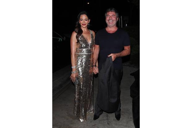 Später durften sich die prominenten Gäste in ihre schönsten Abendgarderoben schmeißen. Denn Cowell und seine Freundin Lauren...