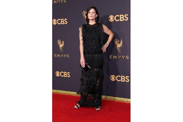 ...Neve Campbell in einem Traum aus Pailletten und Fransen, der seinesgleichen suchte. Das fand man allerdings fast an...