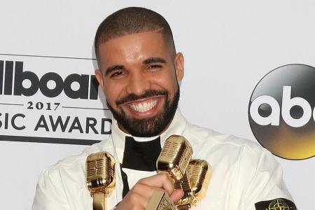 Rapper Drake kann sich über seinen einzigartigen Charterfolg freuen. Rapper Drake kann sich über seinen einzigartigen Charterfolg freuen.