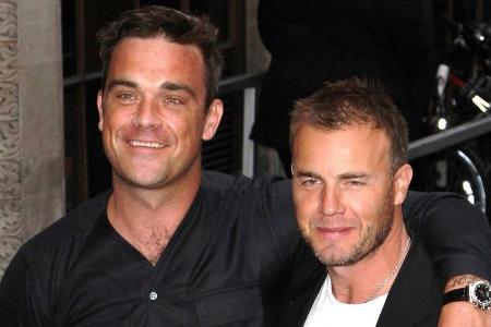 Robbie Williams (l.) und Gary Barlow kamen in der Corona-Krise mehr als einmal virtuell zusammen. Robbie Williams (l.) und Gary Barlow kamen in der Corona-Krise mehr als einmal virtuell zusammen.