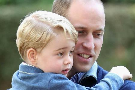 Prinz William mit seinem ältesten Sohn George. Prinz William mit seinem ältesten Sohn George.