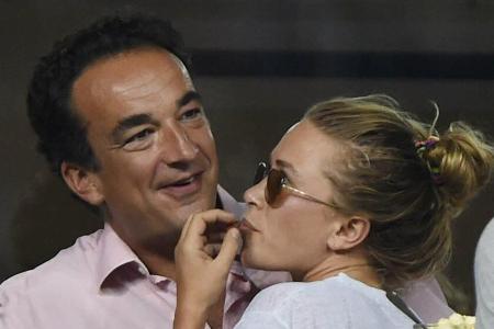 Mary-Kate Olsen und Olivier Sarkozy bei den US Open. Mary-Kate Olsen und Olivier Sarkozy bei den US Open.
