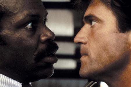 Die Könige des ungleichen Buddy-Kinos: Danny Glover (l.) und Mel Gibson als Chaos-Polizisten Roger Murtaugh und Martin Riggs Die Könige des ungleichen Buddy-Kinos: Danny Glover (l.) und Mel Gibson als Chaos-Polizisten Roger Murtaugh und Martin Riggs