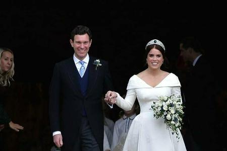Prinzessin Eugenie und ihr Ehemann Jack Brooksbank während ihrer Hochzeit im Jahr 2018. Prinzessin Eugenie und ihr Ehemann Jack Brooksbank während ihrer Hochzeit im Jahr 2018.
