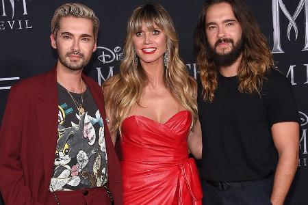 Bill Kaulitz (li.) mit seinem Bruder Tom und Heidi Klum auf dem roten Teppich. Bill Kaulitz (li.) mit seinem Bruder Tom und Heidi Klum auf dem roten Teppich.
