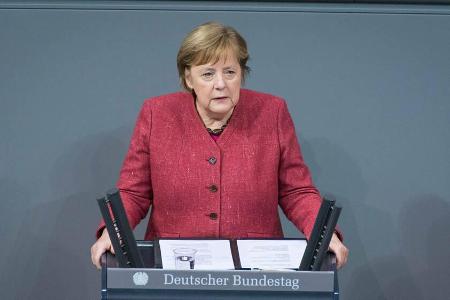 In einer emotionalen Rede plädierte Kanzlerin Merkel am Mittwoch (9. Dezember) für härtere Maßnahmen. In einer emotionalen Rede plädierte Kanzlerin Merkel am Mittwoch (9. Dezember) für härtere Maßnahmen.