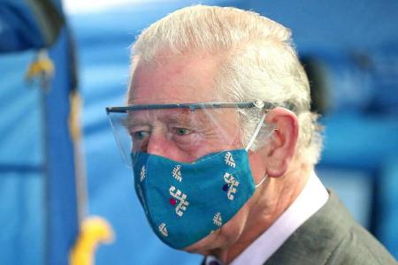 Prinz Charles während des Besuchs eines Corona-Impfzentrums in Gloucestershire. Prinz Charles während des Besuchs eines Corona-Impfzentrums in Gloucestershire.