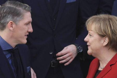 Bastian Schweinsteiger und Angela Merkel in Berlin Bastian Schweinsteiger und Angela Merkel in Berlin