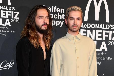 Tom (l.) und Bill Kaulitz auf einer Benefizgala in München Tom (l.) und Bill Kaulitz auf einer Benefizgala in München