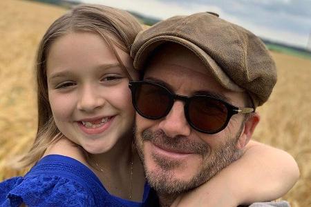 David Beckham zusammen mit seiner Tochter Harper David Beckham zusammen mit seiner Tochter Harper