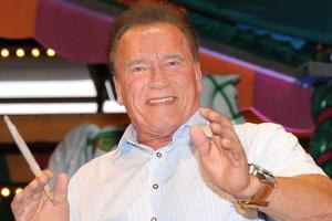 "Steirermen san very good": Arnie dirigiert im Oktoberfestzelt
