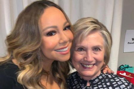 Mariah Carey (l.) trifft Hilarry Clinton Mariah Carey (l.) trifft Hilarry Clinton