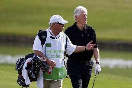 Bill Clinton (r.) bei einer Runde Golf Bill Clinton (r.) bei einer Runde Golf