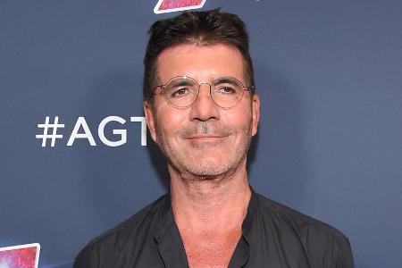 Simon Cowell hat ein Herz für Hunde Simon Cowell hat ein Herz für Hunde