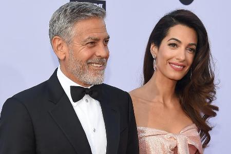 George Clooney mit Ehefrau Amal bei einem Auftritt in Los Angeles George Clooney mit Ehefrau Amal bei einem Auftritt in Los Angeles