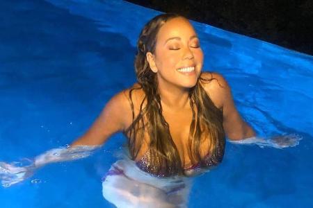 Mariah Carey entflieht der Kälte und genießt den Start ins Jahr im Pool Mariah Carey entflieht der Kälte und genießt den Start ins Jahr im Pool