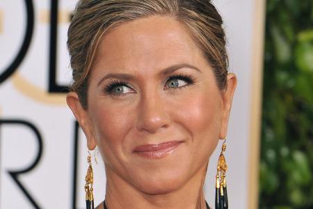 Jennifer Aniston sorgte bei den Golden Globes 2015 mit ungewaschenen Haaren für Aufsehen Jennifer Aniston sorgte bei den Golden Globes 2015 mit ungewaschenen Haaren für Aufsehen