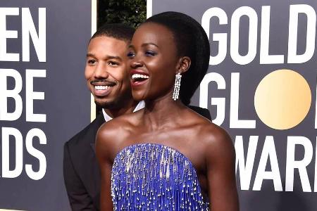 Michael B. Jordan und Lupita Nyong'o bei den Golden Globe Awards in Beverly Hills Michael B. Jordan und Lupita Nyong'o bei den Golden Globe Awards in Beverly Hills