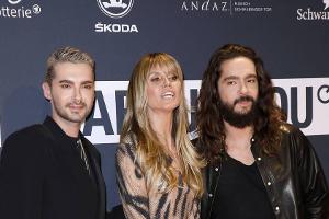 Heidi Klum mit Tom und Bill Kaulitz auf dem roten Teppich