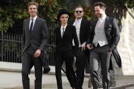 Cara Delevingne (Mitte) kam im Anzug zur Hochzeit von Prinzessin Eugenie Cara Delevingne (Mitte) kam im Anzug zur Hochzeit von Prinzessin Eugenie