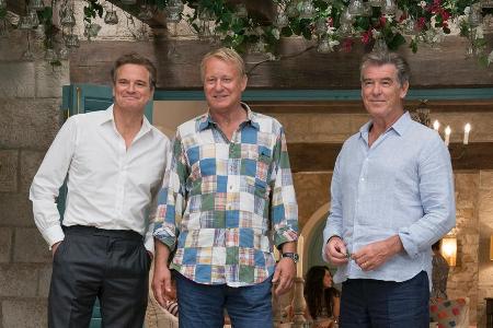 Colin Firth (v.l.), Stellan Skarsgård und Pierce Brosnan sind in Colin Firth (v.l.), Stellan Skarsgård und Pierce Brosnan sind in