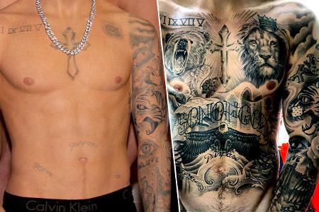 Justin Bieber ist am Oberkörper und den Armen mit Tattoos verziert Justin Bieber ist am Oberkörper und den Armen mit Tattoos verziert