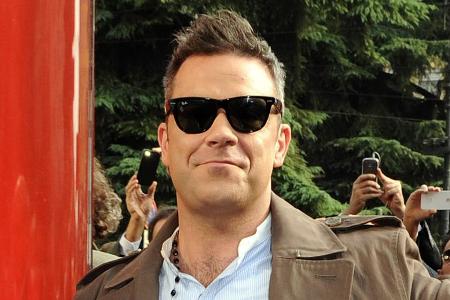 Robbie Williams bei einem Auftritt in Mailand