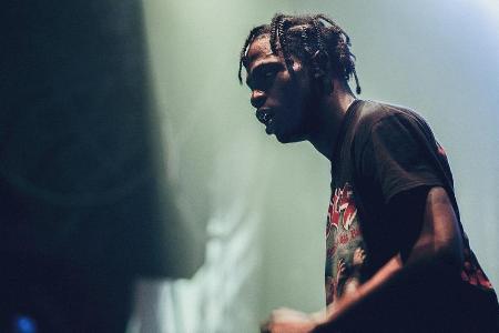 Travis Scott während eines Konzerts 2014 Travis Scott während eines Konzerts 2014