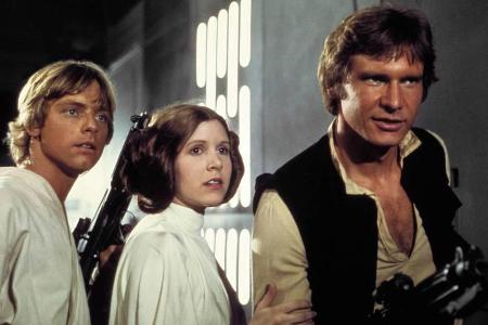 Harrison Ford (r.) als Han Solo, Carrie Fisher als Prinzessin Leia und Mark Hamill als Luke Skywalker sind aus dem Harrison Ford (r.) als Han Solo, Carrie Fisher als Prinzessin Leia und Mark Hamill als Luke Skywalker sind aus dem