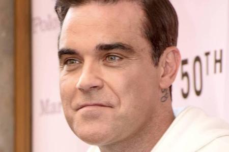 Robbie Williams' Gesicht sah in letzter Zeit voller aus als gewohnt Robbie Williams' Gesicht sah in letzter Zeit voller aus als gewohnt