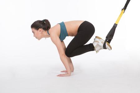Sixpack mit TRX-Crunches