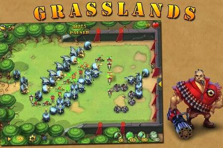 Fieldrunners: Bauen Sie Geschütztürme und verjagen Sie Ihre Feinde.