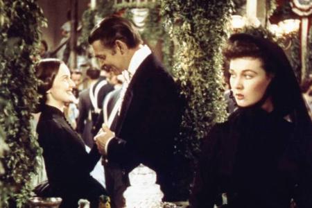 Vivien Leigh (li.), Clark Gable und Olivia de Havilland in Vivien Leigh (li.), Clark Gable und Olivia de Havilland in