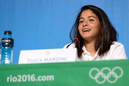 Yusra Mardini bei einer Pressekonferenz Yusra Mardini bei einer Pressekonferenz