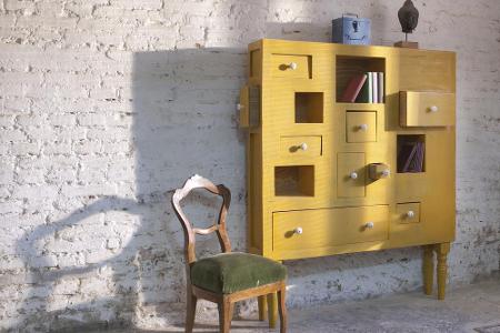 Wählen Sie Knäufe, die eine andere Farbe als das jeweilige Möbelstück hat - und sorgen Sie so für interessante Kontraste.