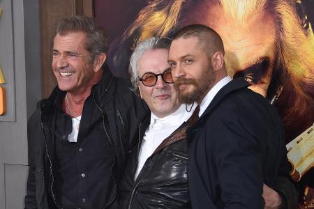 George Miller (Mitte) mit seinen George Miller (Mitte) mit seinen