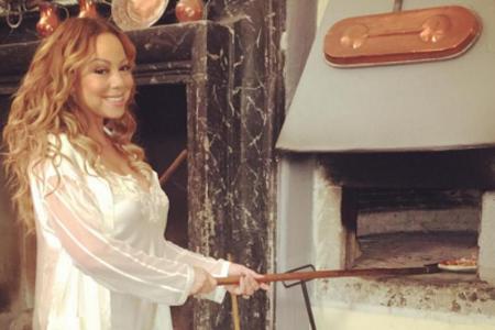 Mariah Carey sieht auch am Ofen verführerisch aus Mariah Carey sieht auch am Ofen verführerisch aus