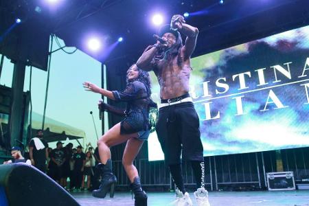 Rapper Lil Wayne und Christina Milian bei einem Auftritt im August 2015 Rapper Lil Wayne und Christina Milian bei einem Auftritt im August 2015
