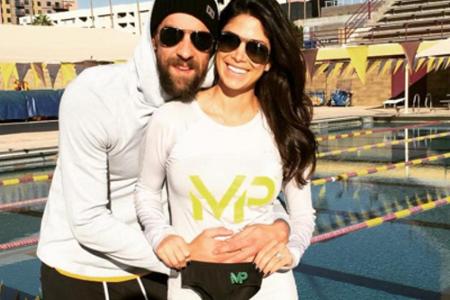 Michael Phelps und seine Verlobte Nicole Johnson Michael Phelps und seine Verlobte Nicole Johnson