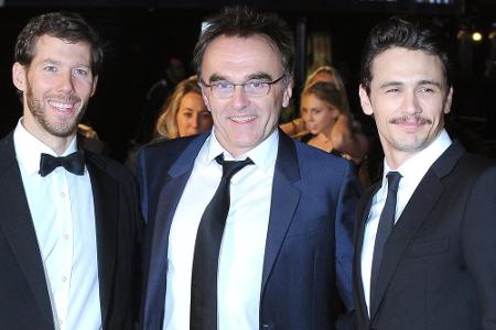 James Franco (r.), Danny Boyle (M.) und Aron Ralston bei der Premiere von 
