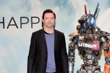 Hugh Jackman und sein androider Begleiter aus dem Film Hugh Jackman und sein androider Begleiter aus dem Film