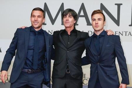 Drei Protagonisten der WM 2014: Lukas Podolski, Jogi Löw und Mario Götze (v.l.n.r.) Drei Protagonisten der WM 2014: Lukas Podolski, Jogi Löw und Mario Götze (v.l.n.r.)