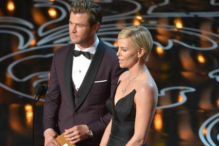 Charliza Theron und Chris Hemsworth bei der Oscar-Verleihung 2014 Charliza Theron und Chris Hemsworth bei der Oscar-Verleihung 2014