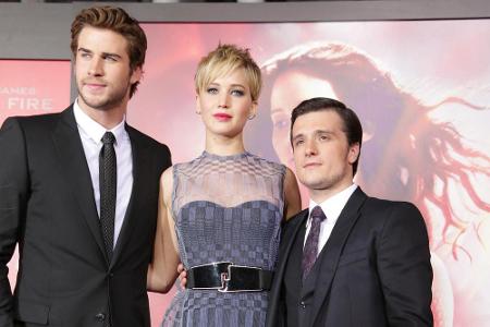 Jennifer Lawrence mit ihren Co-Stars Liam Hemsworth (l.) und Josh Hutcherson Jennifer Lawrence mit ihren Co-Stars Liam Hemsworth (l.) und Josh Hutcherson