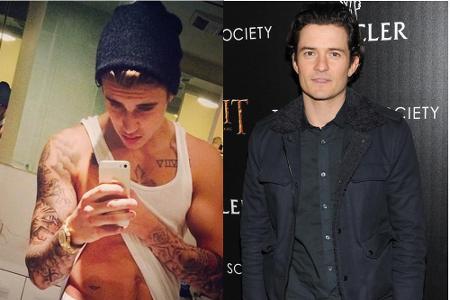 Selfie-König gegen bodenständigen Schwiegermütter-Traum: Justin Bieber (l.) im Streit mit Orlando Bloom (r.) Selfie-König gegen bodenständigen Schwiegermütter-Traum: Justin Bieber (l.) im Streit mit Orlando Bloom (r.)