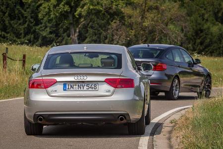Audi A5 Sportback 3.0 TFSI, BMW 335i GT, Heckansicht Audi A5 Sportback 3.0 TFSI, BMW 335i GT, Heckansicht