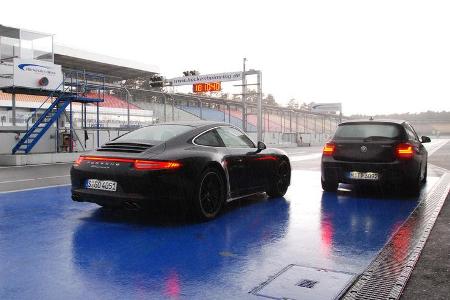 Porsche 911 Carrera 4, BMW M135i xDrive,