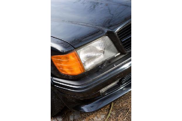 Frontscheinwerfer und Blinker eines Mercedes-Benz 500 SEC-AMG, Baujahr 1982